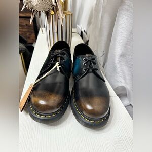 Dr. Martens Black and Brown Oxfords